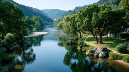 Fototapeta premium Serene River Winding Through Lush Green Hills and Trees in Bright Sunlight With Reflections On Calm Water