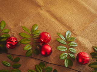 Christmas balls on calico for a warm copy space in winter and New Year.