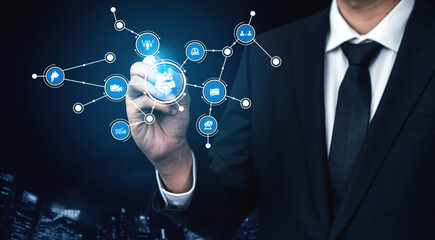 A businessman in a suit interacts with digital connections, representing global networking and communication through modern technology and urban design elements. Tessel