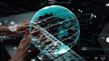 A captivating digital globe overlays with data graphics against a keyboard backdrop, symbolizing the intersection of technology and global communication in a modern workspace. Xenic