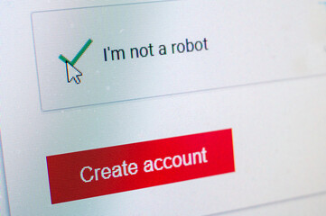 Not a Robot Captcha and Create Account Screen With Green Check Mark On Red Button