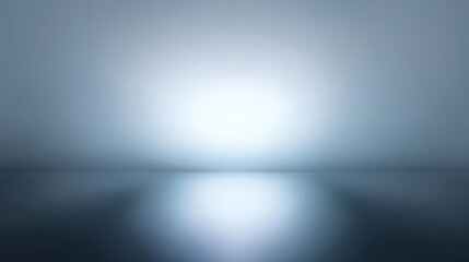 A minimalist abstract background featuring a gradient of light blue to dark grey with a bright central glow reflected on a dark, glossy surface, blurred white background