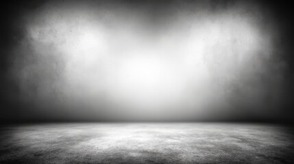A dramatic grayscale image of an empty textured concrete room with a bright spotlight illuminating the center of the back wall, a stark, minimalist backdrop effect, blurred white background
