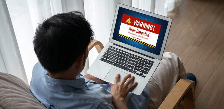 Virus warning alert on computer screen detected modish cyber threat , hacker, computer virus and malware