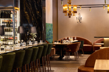 Elegant restaurant interior with cozy seating and warm lighting