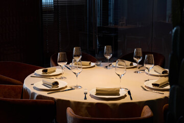 Elegant dining table set for a special evening in a modern restaurant