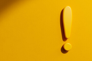 Yellow Exclamation mark on orange wall background, Warning, attention danger concept. banner, copy space. 3d render
