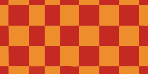 Abstract geometric background with a classic checkerboard design. This seamless pattern features alternating red and orange squares in a vibrant, simple layout
