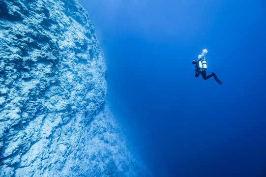 A diver explore the clear ocean in the Maldives
