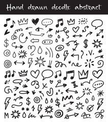 Collection of hand drawn black ink doodle elements and abstract shapes on white background