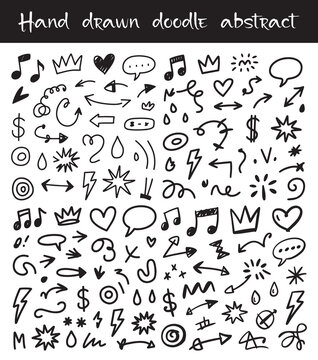 Collection of hand drawn black ink doodle elements and abstract shapes on white background