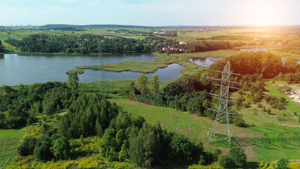 High voltage power lines over scenic lake