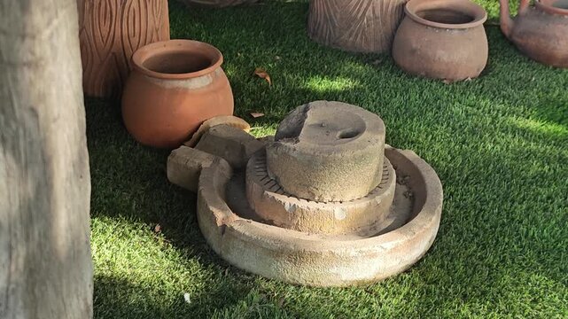 Old millstone or grindstone. Vintage.