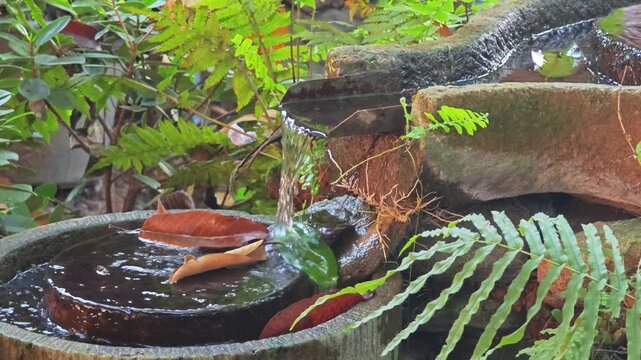 Fountain from old millstone or grindstone.