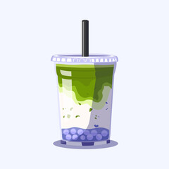 Green matcha and taro milk drink with tapioca pearls served in a plastic cup.