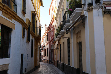 Historic alley in the old town of Macarena, Seville, Andalusia, Spain  