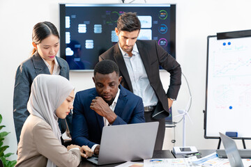 Naklejka premium team of multiethnic colleague discuss budget performance planning, sharing idea for cost reduction, business people man woman diverse employee coworker in formal suit meeting in finance office