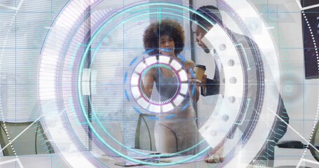 Colleagues analyzing project docs by laptop causing UI overlay emphasizing data points for review - Powered by Adobe