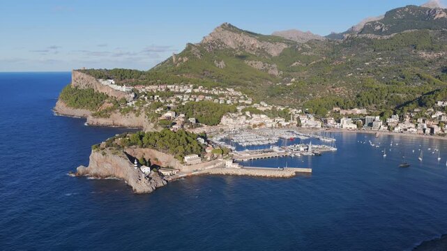 Golden Hour Aerial Panorama of Port Soller Harbor and Tramuntana Mountains in Mallorca, Spain