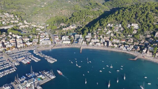 Golden Hour Aerial Panorama of Port Soller Harbor and Tramuntana Mountains in Mallorca, Spain