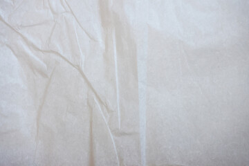 Obraz premium Crumpled Craft Paper Background Top View