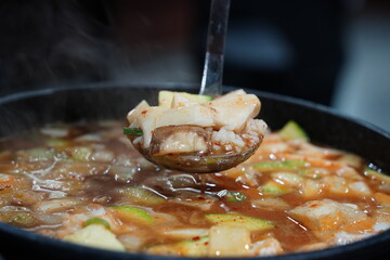 Hearty Korean Soybean Paste Stew with Rice, Tofu, and Vegetables