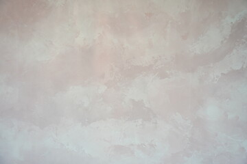 Subtle mauve plaster texture with blended hues and an abstract, elegant finish, suitable for a background or design element.