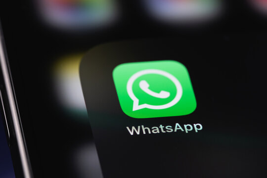 WhatsApp icon mobile app on a screen smartphone iPhone closeup. WhatsApp is a popular free instant text messaging system for mobile and other platforms. Batumi, Georgia - September 6, 2025