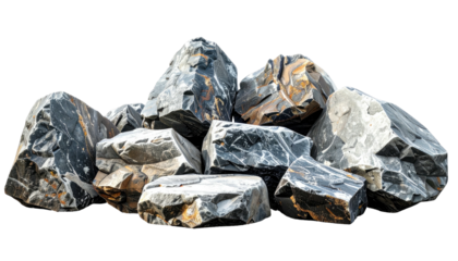 Heap of grey rocks with some brown spots isolated on a black background, varied in size, unevenly stacked