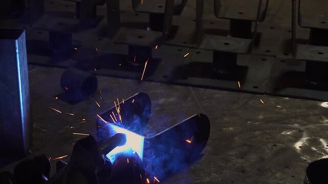 Welding fabrication process metal binding process up-close slow motion