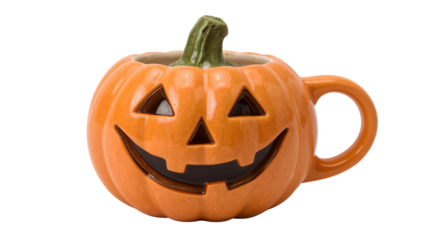 Ceramic pumpkin mug with jackolantern face handle isolated on the transparent background for halloween and autumn festivities