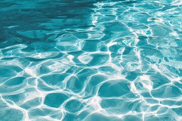 Turquoise Water Surface Reflecting Sunlight Creating Abstract Patterns