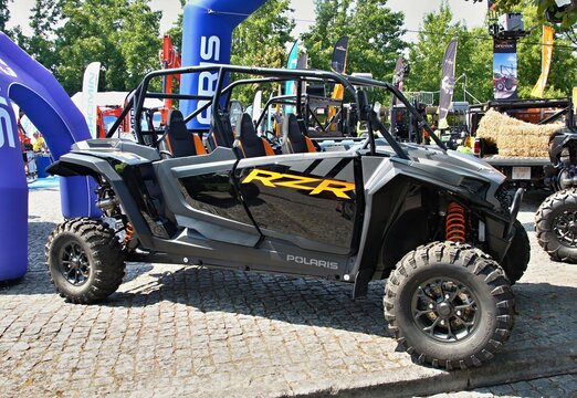 Polaris RZR UTV vehicle displaying at outdoor expo