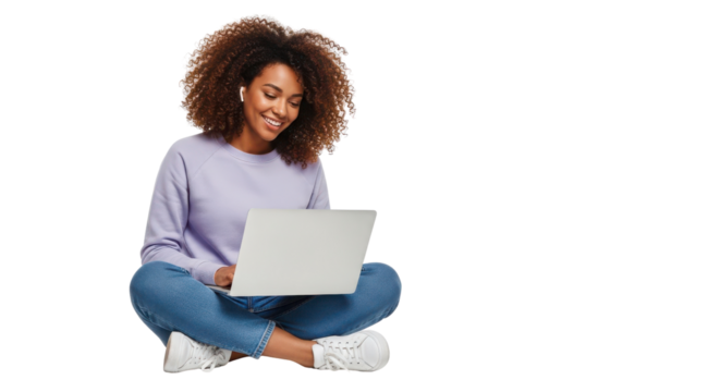 Smiling young African American woman using a laptop for remote work or online studying. isolated PNG with Transparent Background