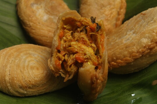 karipap isolated on banana leaf