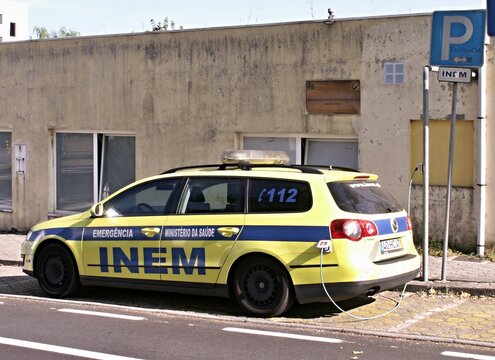INEM emergency vehicle charging electric car in Portugal