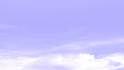 Fototapeta premium Purple sky with white cloud. Pastel colour backdrop of sunset sky. Beautiful nature. Summer color backgrounds concept. Copy space is on the right.