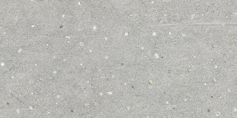 Gray concrete texture with stones for ceramic tile design. Cement background for a porcelain tile carpet.