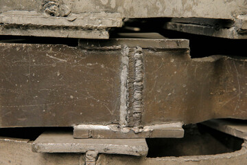 Metal rusty gold, detail of a wall of metal and welded gold, copper and bronze