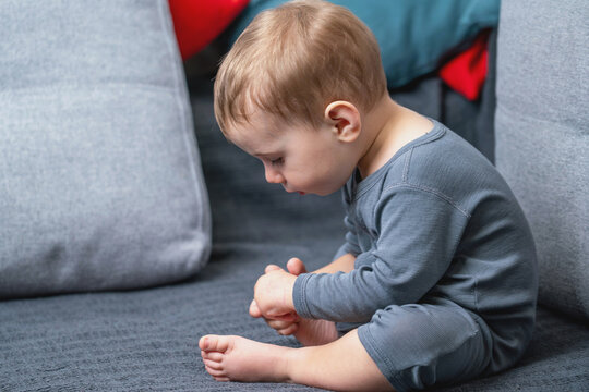 Preschool child engaged in early yoga training.