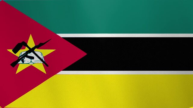 The national flag of Mozambique with its horizontal stripes and emblem featuring a rifle, book, and hoe.