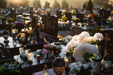 Flowers and lights on the graves on All Souls' Day in Poland