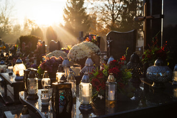 Flowers and lights on the graves on All Souls' Day in Poland