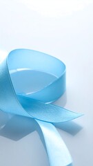 Simple image of a blue ribbon on a plain white background