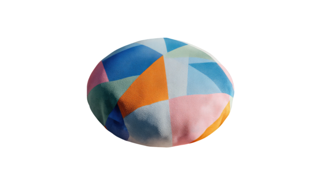 Soft sphere of fabric with colorful geometric patches against black backdrop, with gentle lighting - Powered by Adobe