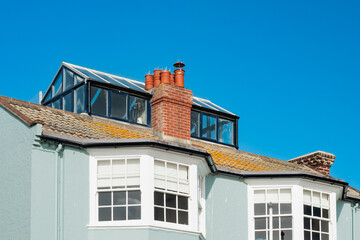 Unusual, roof fitted conservatory and glass room fitted on top of a seaside town house in the tourist town of Aldeburgh, Suffolk. The upstairs windows also have an excellent view of the North Sea.