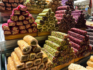 Colorful stacks of Turkish delight sweets inside the Grand Bazaar