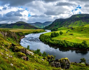 Verdant hills meet flowing river under a dramatic, clouded sky