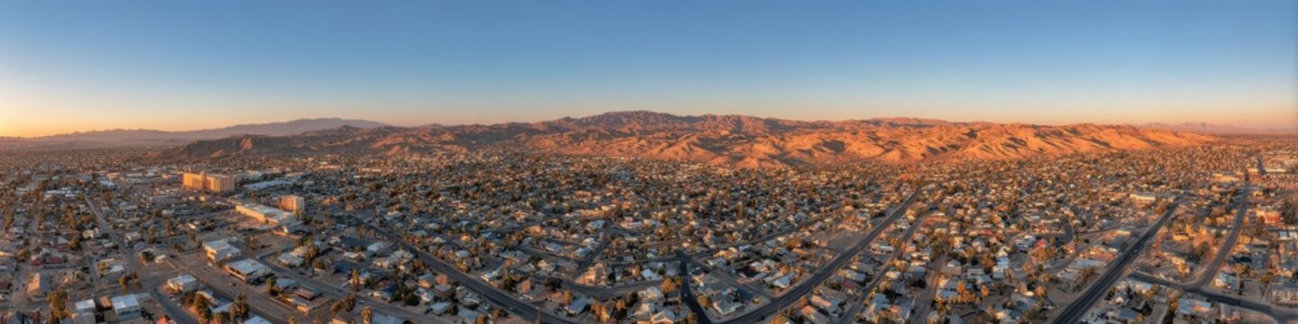 Aerial View of Barstow, California at Sunset: Panorama of Urban Landscape and Architecture Silhouette in San Bernardino County