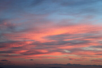 Fiery Horizon A Sky Ablaze with Sunset Hues. Pink and Blue Clouds